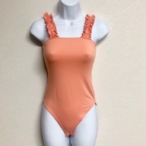 Gaze pastel orange ruffle strap bodysuit